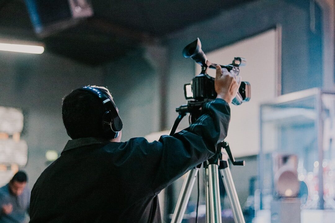 cinematographer adjusting lights