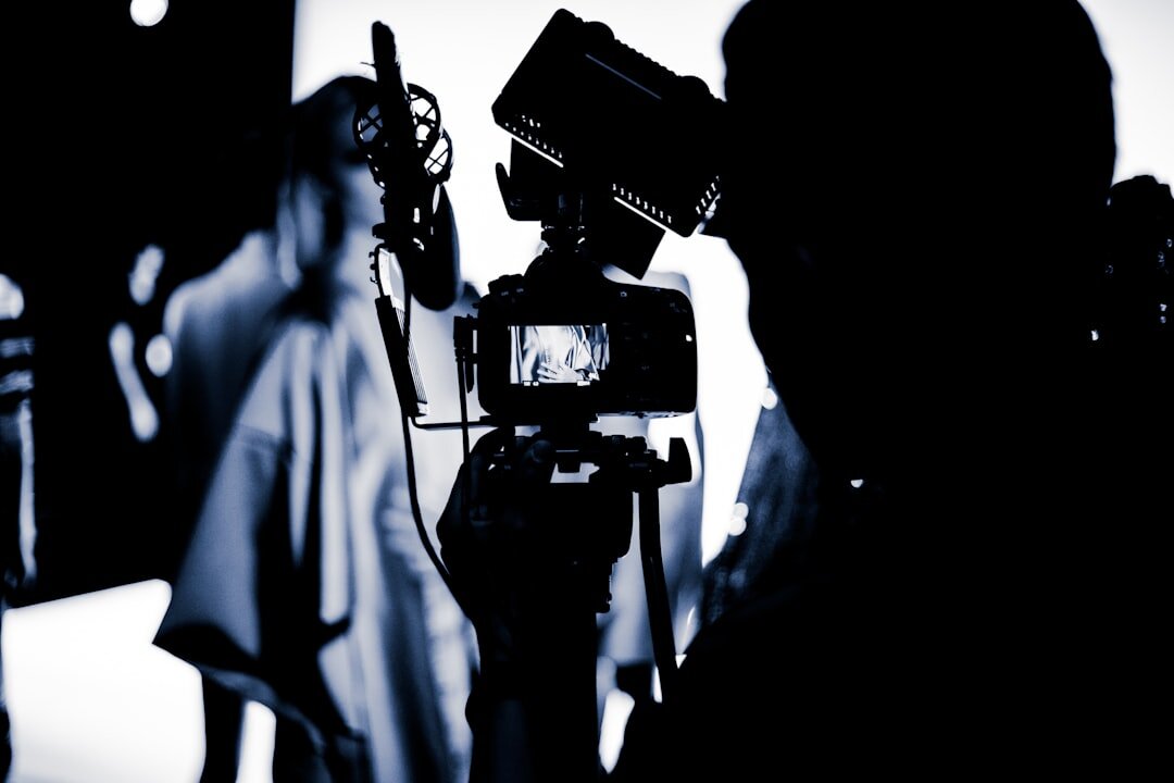 cinematographer adjusting lights