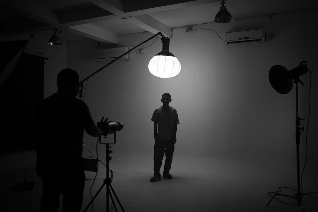 cinematographer adjusting lights