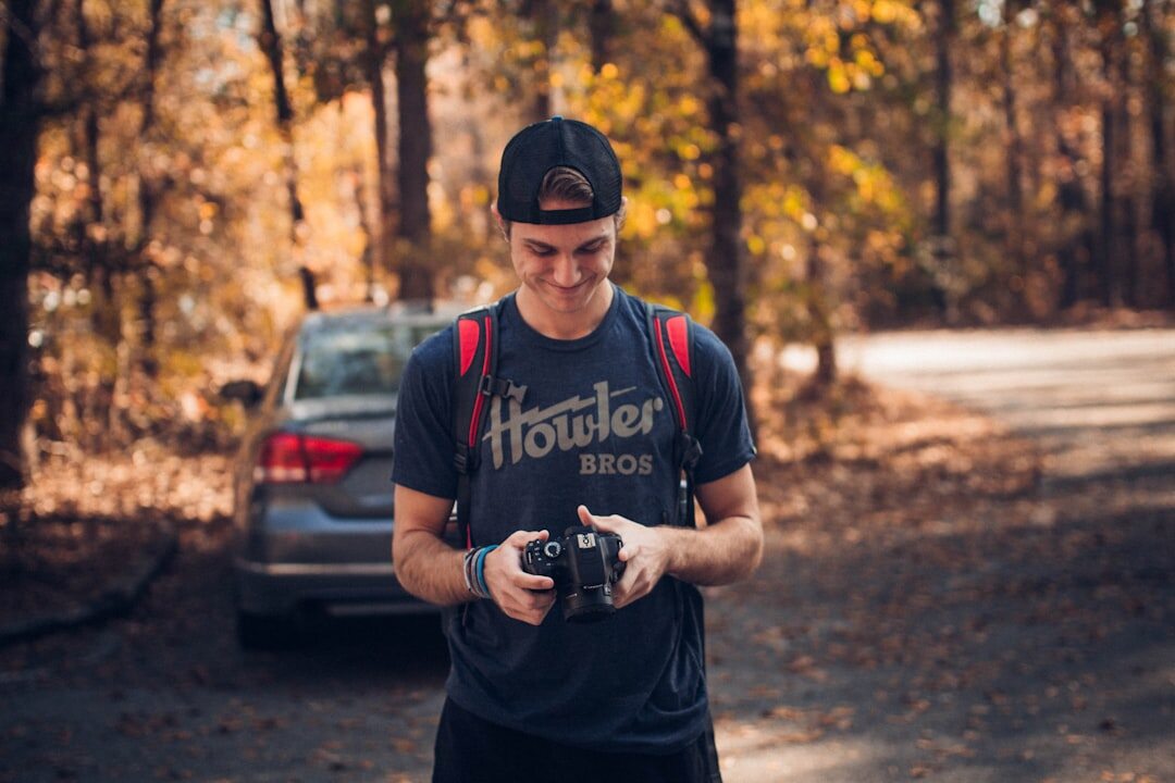 filmmaker reviewing footage outdoors